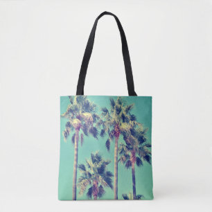 Tropische palmbomen tegen een Blauwgroen hemelfoto Tote Bag