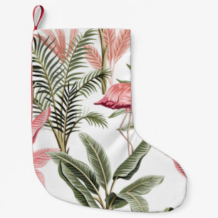 Tropische roze flamingo, bananenbomen en kleine kerstsok