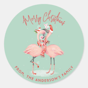 Tropische roze flamingo met kerstmutsen ronde sticker
