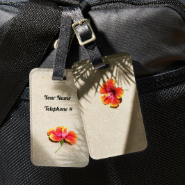 Tropische virussen Hibiscus op strand zand Bagagelabel