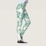 Tropische Waterverf Greenery Yoga Leggings<br><div class="desc">Stap in de tropen met deze unieke leggings, met originele waterverf kunstwerken in een levendig tropisch patroon van monstera bladeren in de kleuren groen en blauw. Deze stijlvolle zomerbroek is perfect voor het toevoegen van een vleugje van de tropen aan uw garderobe. Ideaal als yogabroek of voor casual draag, ze...</div>