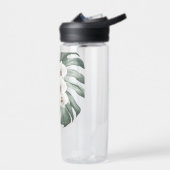 Tropische witte orchideeën op Monstera met Monogra Waterfles (Links)