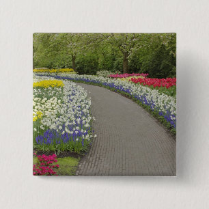 Trottoirpad door tulpen en narcissen, 2 vierkante button 5,1 cm