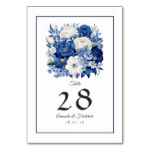 Trouw met marineblauw en witte bloemen