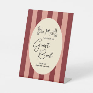 Trouwgastboekbord met vintage rode roze gestreepte reclamebord met voetstuk