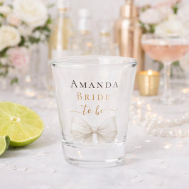 Trouwjurk ivoren strik parels elegante vrijgezelle shot glas