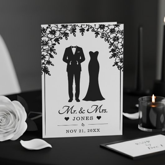 Trouwjurk Tuxedo Bloemboog Foto van Mr & Mrs Programma