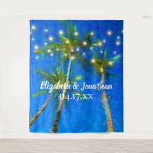 Trouwlocatie strand bruiloft palmboom slingerlicht