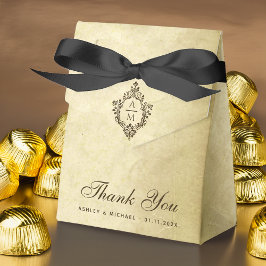 Trouwmonogram op perkament dank je bedankdoosjes
