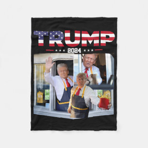 Trump bedient de drive-thru fastfoodwerker Frans Fleece Deken