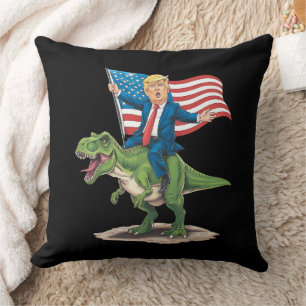 Trump rijdt op dinosaurus T Rex USA Amerikaanse vl Kussen
