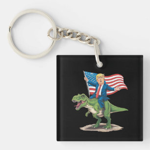 Trump rijdt op dinosaurus T Rex USA Amerikaanse vl Sleutelhanger