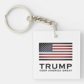 Trump-sleutelhanger met Amerikaanse vlag houdt Ame Sleutelhanger (voorkant)