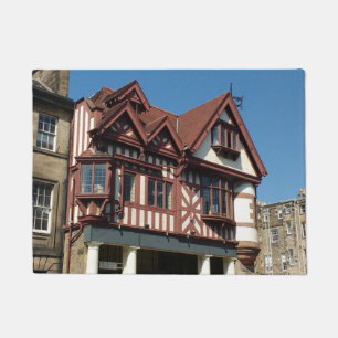Tudor oak lijst building, Edinburgh, Schotland Deurmat