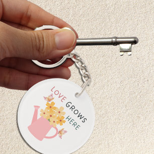 Tuin met de quote 'Liefde groeit hier' Sleutelhanger
