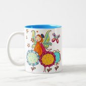 Tuinboer met bloemen tweekleurige koffiemok (Links)