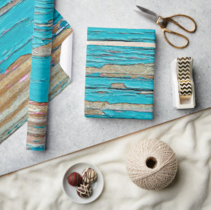 Turkoois verf op verweerd hout cadeaupapier
