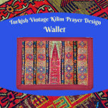 Turks  Kilim Gebedskleed Ontwerp Drievoud Portemonnee<br><div class="desc">Dit heldere kleurrijke tribale ontwerp is afkomstig van een origineel handgeweven en tijdloos  kilim gebedskleed. De kilim werd in Turkije geweven met behulp van plantaardige kleurstoffen en handgesponnen wol. De kleuren zijn levendig blauw,  donkermarineblauw,  roze rood,  sinaasappel en gebroken wit. Het unieke design werkt prachtig op deze portemonnee.</div>
