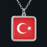 Turkse vlag zilver vergulden ketting<br><div class="desc">De Turkse vlag is rood met een aflopende maan in het midden en een vijfdelige ster.</div>