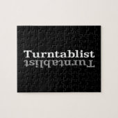 Turntablist ʇ sılqɐ ʇ uɹ ⊥ legpuzzel (Horizontaal)