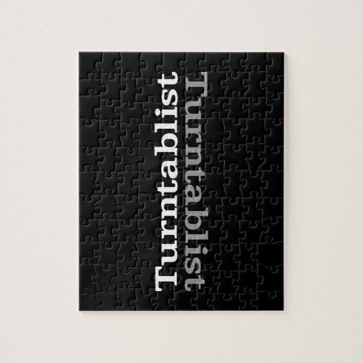 Turntablist ʇ sılqɐ ʇ uɹ ⊥ legpuzzel (Verticaal)