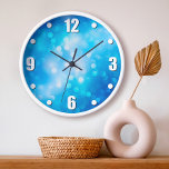 Turquoise blauw bokeh ombre abstracte stippen eenv grote klok<br><div class="desc">De kleine,  ronde bokeh-effect lichtcirkels pop van de heldere,  turkooisblauwe abstracte achtergrond. Verleen uw favoriete kamer met deze verbluffende,  levendige wandklok. Uw keuze uit een rond of vierkant klokgezicht. Maakt een geweldig cadeau voor het huishouden! U kunt deze muurklok gemakkelijk personaliseren. Stuur me alstublieft alle vragen of verzoeken.</div>