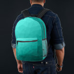Turquoise blauwgroen gradiënt geometrisch maaspatr bedrukte rugzak<br><div class="desc">Turquoise blauwgroen Gradient Geometric Mesh Pattern Gedrukte Rugzak. Cool mode accessoire tas voor iedereen. Turquoise blauwgroen driehoekig geometrisch gaas met een licht tot donker ombre verloopontwerp.</div>
