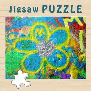 Turquoise gele bloem op een graffiti muur - legpuzzel