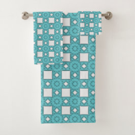 Turquoise geometric-patterned bad handdoek