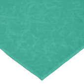 Turquoise gestructureerd oppervlak met subtiel dra tafelkleed (Gekanteld)