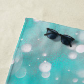 Turquoise grijze bellen naam strandlaken (In situ)