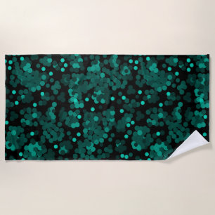 Turquoise groen polka dot patroon op zwart strandlaken