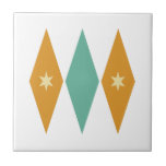 Turquoise Oranje Diamonds Cream Stars Mid Century Tegeltje<br><div class="desc">Deze kleurrijke moderne keramische tegels uit het midden van de eeuw hebben turkooisblauwe en oranje diamanten met roomkleurige sterren. Zo leuk om aan uw betegelproject toe te voegen!</div>