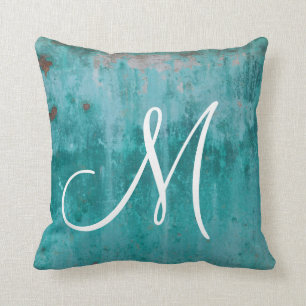 Turquoise roest monogram kussen