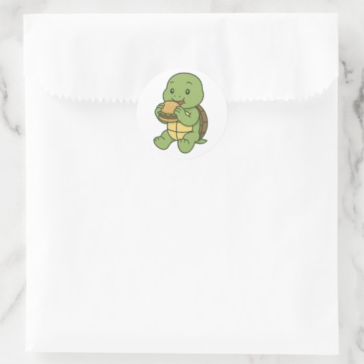 Turtle eating a burger  ronde sticker (Tas)