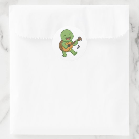Turtle playing a guitar  ronde sticker (Tas)
