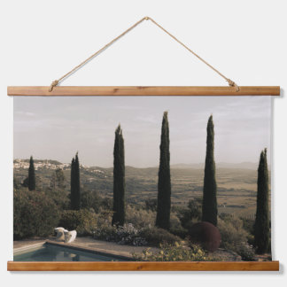 Tuscan landscape hidden behind cypresses (2024) hangend wandkleed
