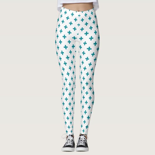 Tuurquoise polka kruisen op wit leggings (Voorkant)