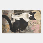 Tuxedo kat op een rots zitten in een tuin rechthoekige sticker (Voorkant)