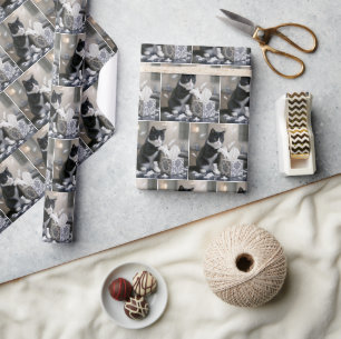 Tuxedo kat speelt met een tissue doos cadeaupapier