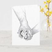 Twee armen zijn met elkaar in elkaar geslagen in t kaart (Gele Bloem)