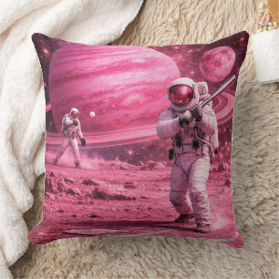 Twee astronauten die honkbal spelen op de roze pla kussen