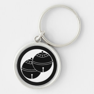 Twee bellen in een cirkel sleutelhanger