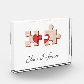 Twee bijpassende puzzelstukjes met een rood hart fotoblokken (Links)