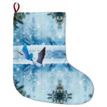 Twee blauw kerstganzen