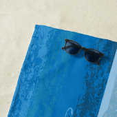 Twee blauwe pinguïns vissen strandlaken (In situ)