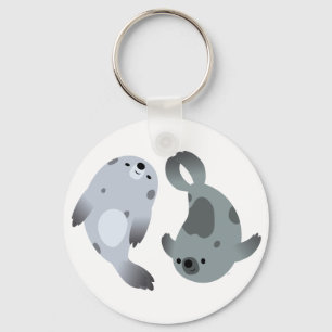 Twee Cute Playful Cartoon Harp Seals Sleutelhanger