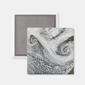 Twee cyclonen gevormd in tandem ten zuiden van IJs Magneet (Voorkant / Achterkant)