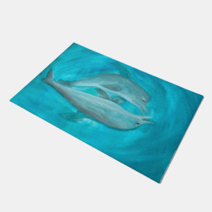 Twee dolfijnen die Wilde en Vrije in de Oceaan spe Deurmat