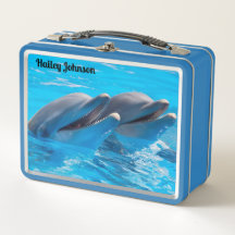 Twee dolfijnen in blauw water